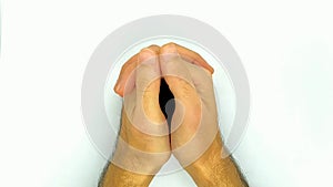 calm hands and fingers of a person calmly gesticulate and listen to the interlocutor on a white background.