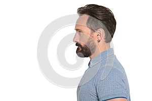 A Calm handsome man profile with beard on white background. Close-up bearded man profile