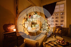 Calm image of interior modern home living room decorated christmas tree and gifts, sofa, table covered with blanket.