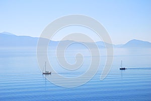 Calm ionian sea waters with sailing yachts