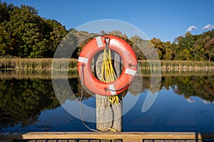 Calm Lake Behind Orange Lifesaver