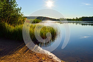 Calm lake and hard sun