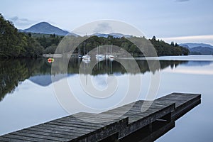 Calm moody evening landscape over Coniston Water in English Lake