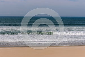 Calm panoramic seaside with beach. Peaceful ocean landscape.