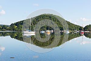 Calm peaceful relaxed morning on a still day at a beautiful lake with cloud reflections