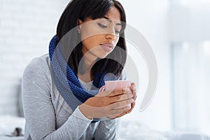 Calm peaceful woman drinking tea