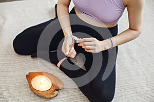 Calm pregnant woman using aromatherapy. Oil aromatic perfumes made of natural essential oils