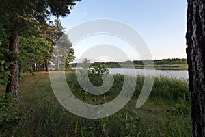 Calm and quiet sunset over the pond photo