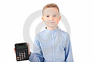 Calm Schoolboy holding calculator. Portrait of funny cute 10s boy .White background