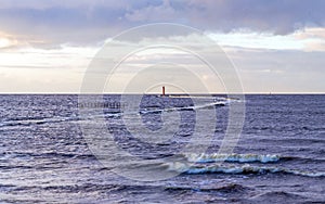 Calm sea background with lighthouse