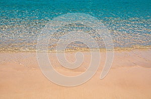 Calm sea beach background. Summer tropical beach with sand. Ocean water. Natural seascape.