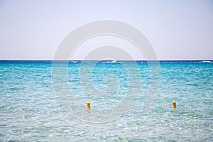 Calm sea empty sandy beach background