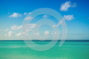 Calm sea, ocean and blue cloudy sky. Horizon. Picturesque Seascape