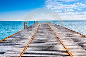 Calm sea and wooden pier