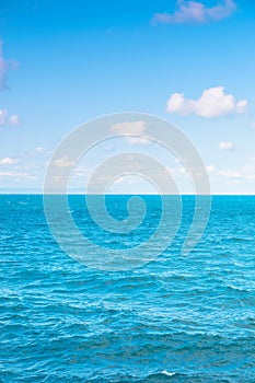 Calm seascape with clouds on the evening sky. blue dreamy vacation background