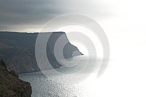 Calm seascape with stormy sky.