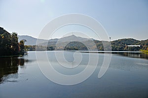 Calm and serene beautiful large lake reservoir with Mountain in Seoul, South Korea