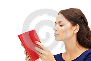 Calm and serious woman with book