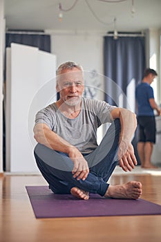 Calm sporty man looking in front of him