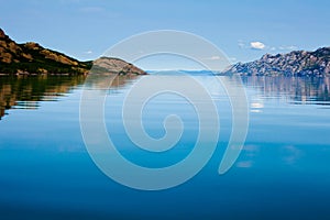 Calm summer day on huge Lake Laberge Yukon Canada