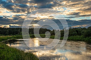 calm summer landscape on the banks of the Berezina River