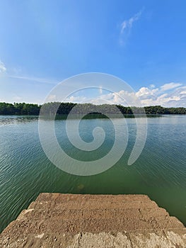 Calm view of stairs and a river at Muar River, Serom 3, Johor, Malaysia