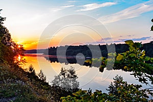 calm vyatka river at sunset on a summer evening