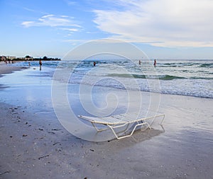 Calm waves of Crescent beach and beach chair