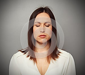 Calm woman with closed eyes