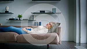 Calm young woman meditating as psychological therapy indoors