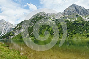 Waterscape in rough mountains and forest, Salzburg, Austria photo