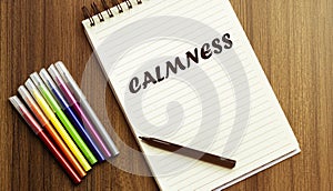 Calmness . your future target searching, a marker, pen, three colored pencils and a notebook for writing