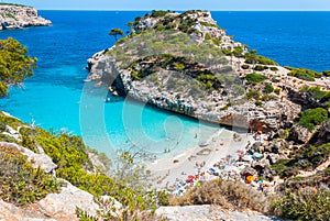 Calo des Moro, Mallorca on a sunny day with people on the beach