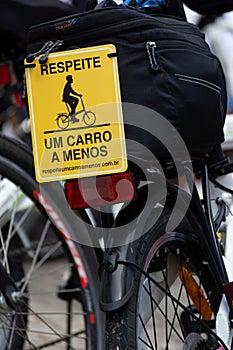 A Caloi brand bicycle with a banner informing about the importance of respect for cyclists on the streets. City of Salvador, Bahia