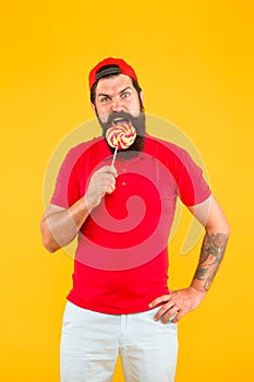 Calories and vitamin. Dieting for health. Keep licking. Sweet taste. Happy hipster eat lollipop candy. Taste of