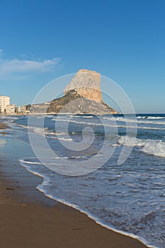 Calp Spain Penon de Ilfach landmark rock blue sky and waves photo