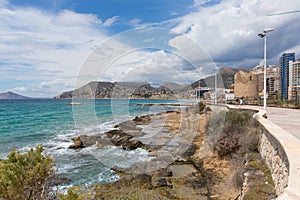 Calp Spain seafront promenade paseo with mountain views and hotels and apartments photo