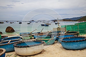 Cam lap nha trang.  boats with fishermen, Crab traps
