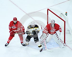 Cam Ward and Patrice Bergeron