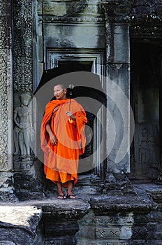 Cambodia Angkor wat gallery with a monk