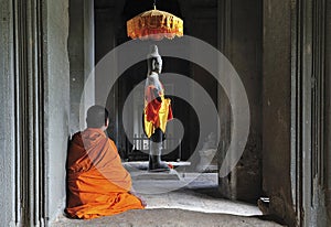 Cambodia Angkor Wat time to pray