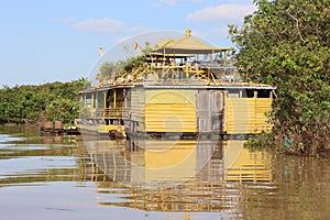 Cambodia. Buddhist temple on stilts, on Tonle Sap lake in Chang Kneas village.