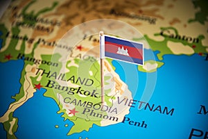 Cambodia marked with a flag on the map