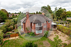 Detached house on large plot in suburban England