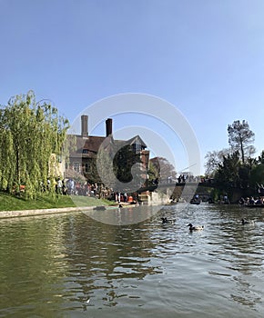 Cambridge, UK - April 20, 2019: View of Jerwood library and the orgasm bridge crossing the river Cam on a sunny day