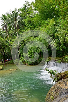 Cambugahay Falls, a 3-tiered waterfall popular for swimming on Siquijor Island in Philippines