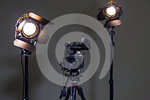 Camcorder and 2 spotlights with Fresnel lenses in the interior. Shooting an interview