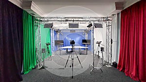 Camcorder in the background in the film studio. Type of photo studio. VideoBlog recording, media production. Video filming in the