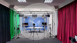 Camcorder in the background in the film studio. Type of photo studio. VideoBlog recording, media production. Video filming in the