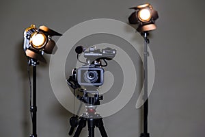 Camcorder and 2 spotlights with Fresnel lenses in the interior. Shooting an interview